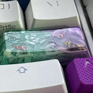 "When you work from home and stare at your keyboard all day, it’s nice to have a @jelly.key Koi keycap to bring peace and tranquillity to your life. This thing is beautiful. The craftsmanship is all hand painted and hand made. And these Koi are so damn small. I don’t know how they did it. And the box they send it in is top notch too." by mstarr512 on Instagram
